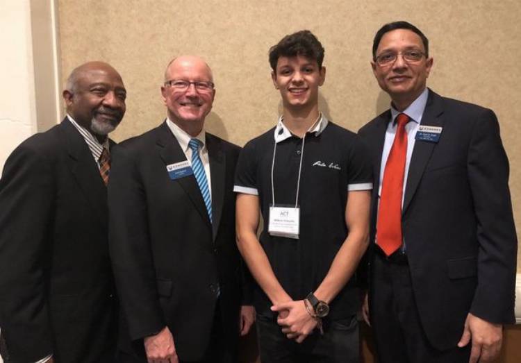 (from left to right) Edmonds CC Trustees Wally Webster II and Carl Zapora, Vinicius Armucho, and Edmonds CC President Dr. Amit B. Singh